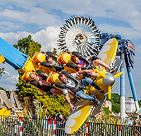 A family enjoys the Air Race ride at Drayton Manor Resort